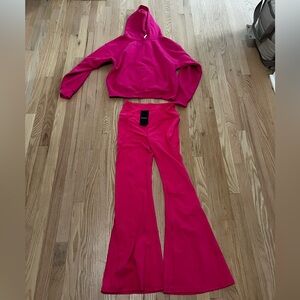 Fabletics pink sweatshirt and yoga pants never worn.